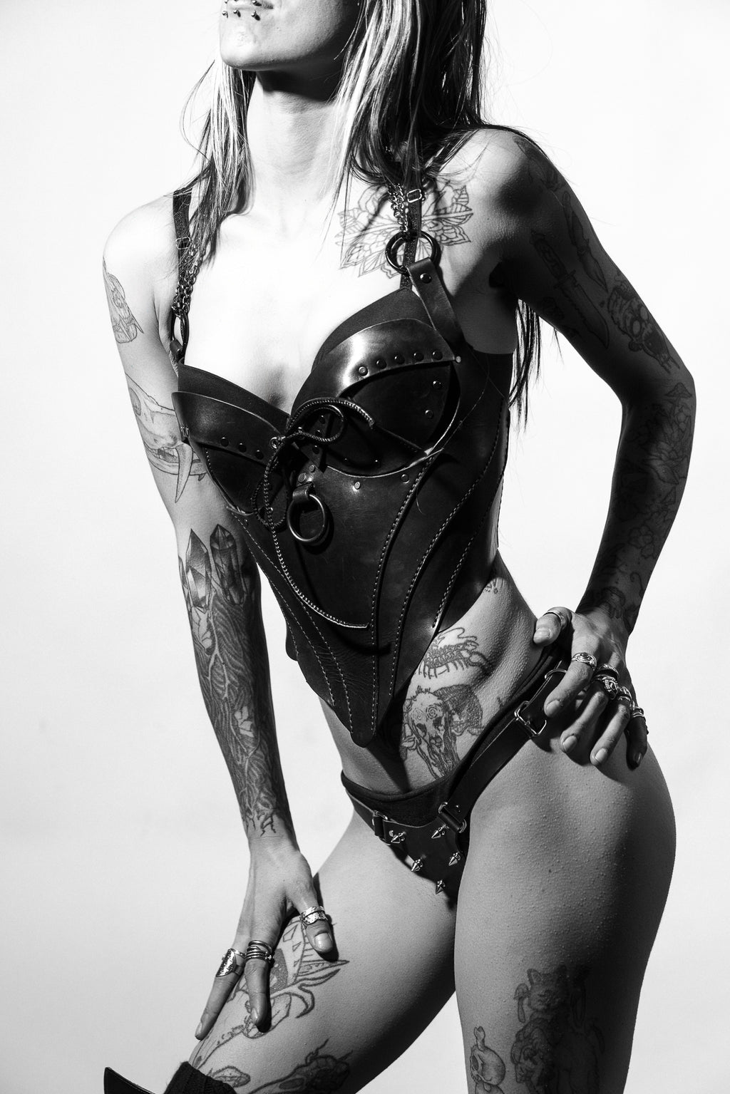 girl wearing immortal corset and spiky thong