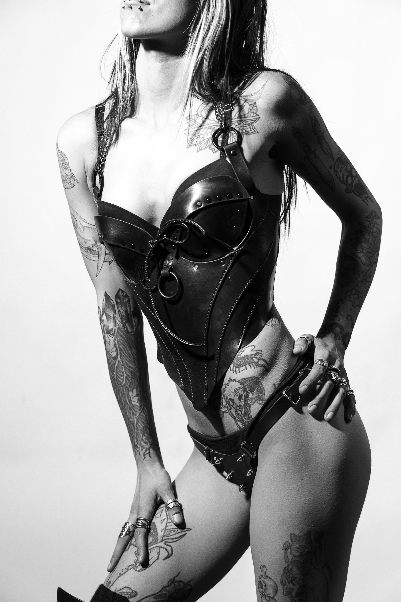 girl wearing immortal corset and spiky thong
